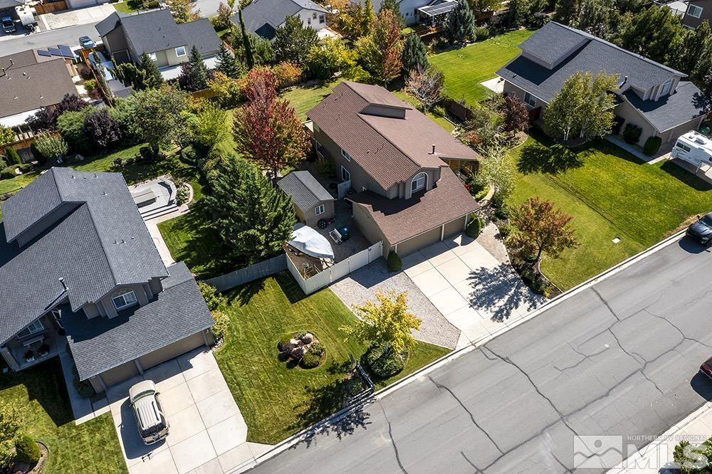 14320 Ghost Rider Drive Reno, NV 89511 - Photo 35 of 40 an aerial view of a house with a yard and lake view