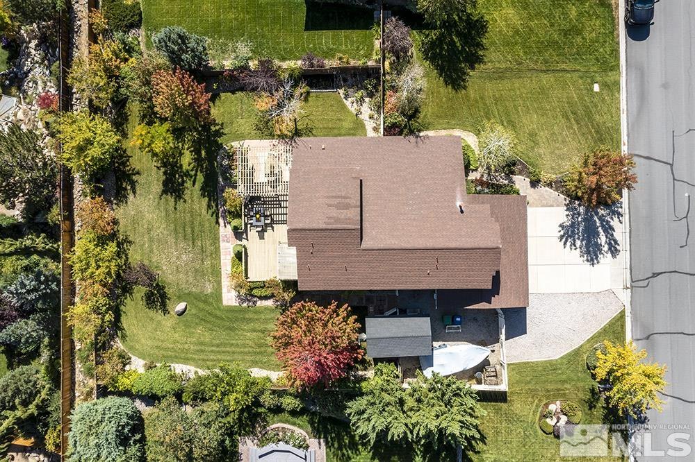 14320 Ghost Rider Drive Reno, NV 89511 - Photo 36 of 40 an aerial view of a house with a yard basket ball court and outdoor seating
