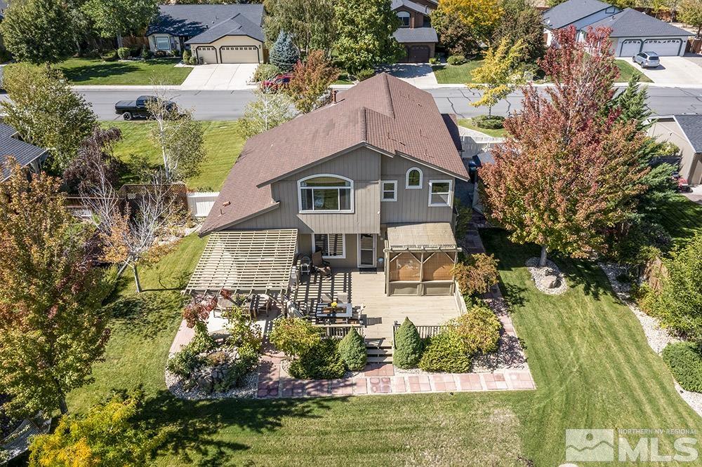 14320 Ghost Rider Drive Reno, NV 89511 - Photo 38 of 40 a house with lots of trees