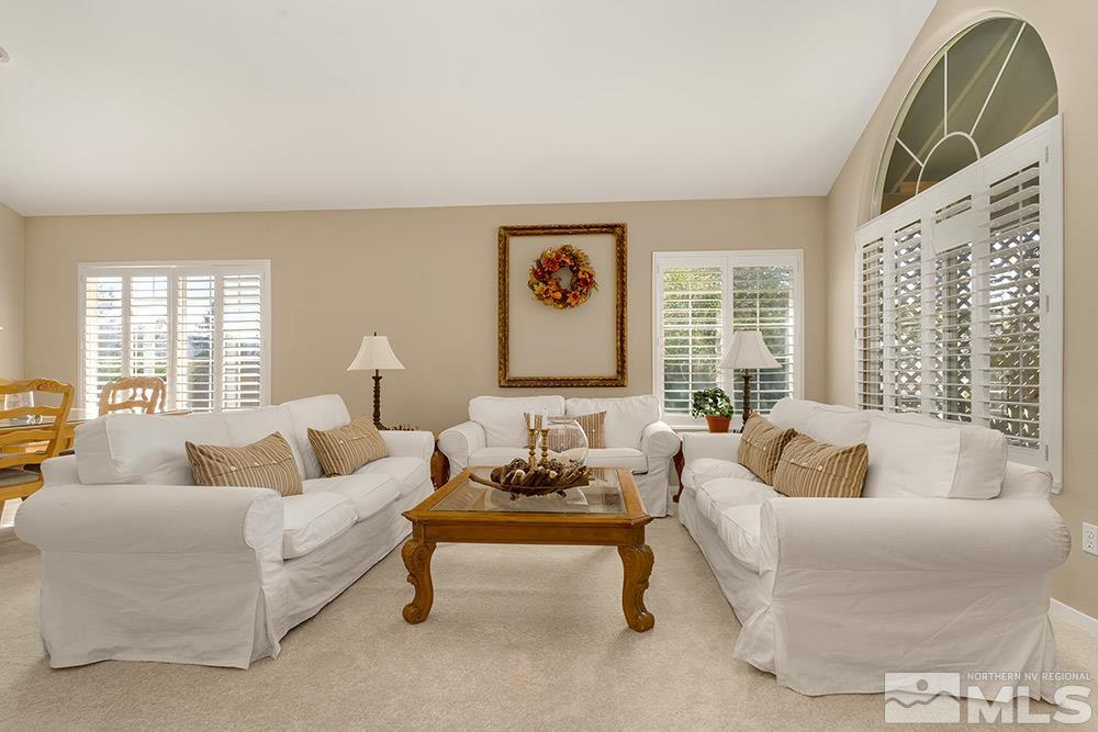14320 Ghost Rider Drive Reno, NV 89511 - Photo 6 of 40 a living room with furniture and a large window