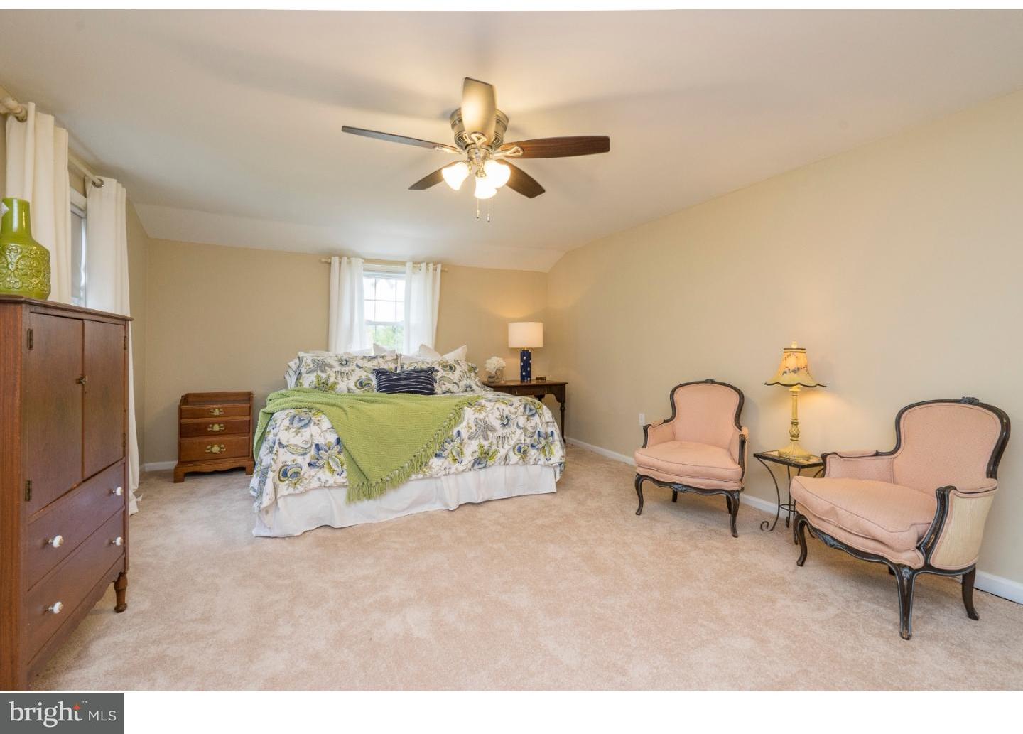 100 Kent Road Springfield, PA 19064 - Photo 11 of 22 a living room with furniture and a chandelier
