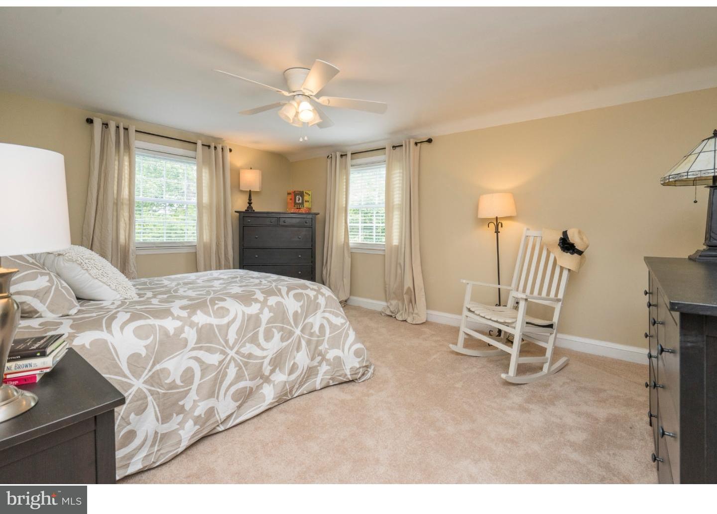 100 Kent Road Springfield, PA 19064 - Photo 14 of 22 a bedroom with a bed chair and window