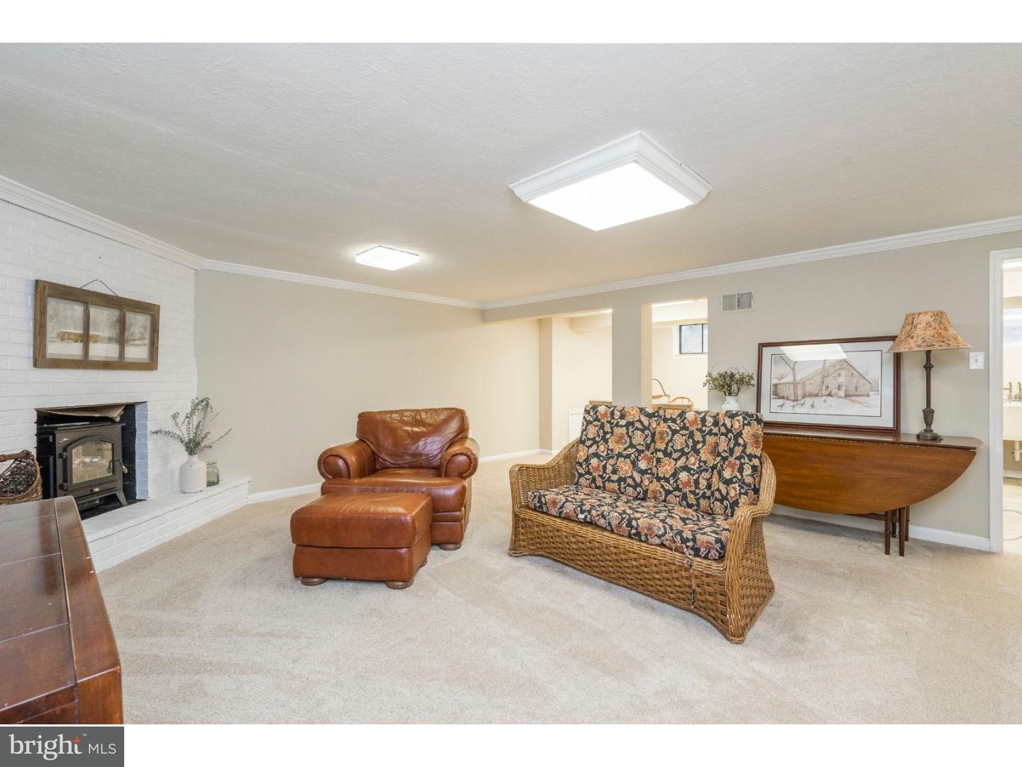 100 Kent Road Springfield, PA 19064 - Photo 19 of 22 a living room with furniture and a couch