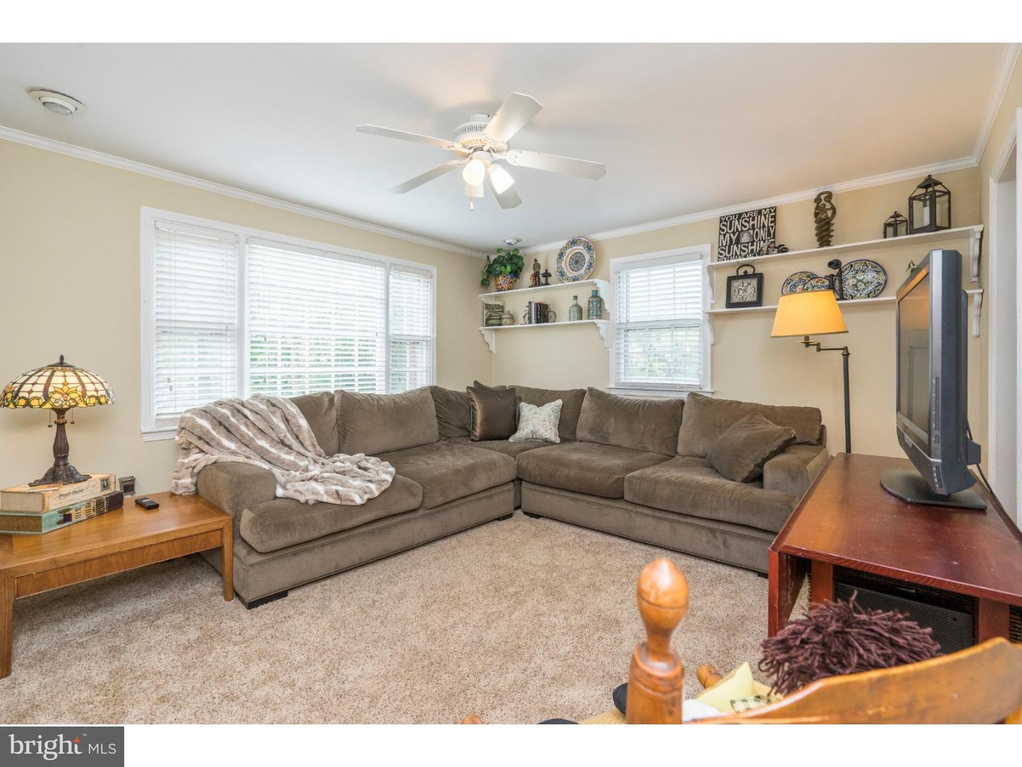 100 Kent Road Springfield, PA 19064 - Photo 9 of 22 a living room with furniture and a flat screen tv