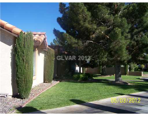 Property Photo. One view of front lawn which is lush and extensive
