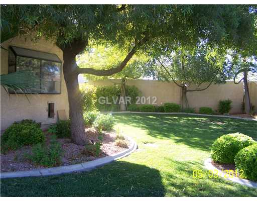 Property Photo. STUNNING YARD FRONT REAR AND SIDE