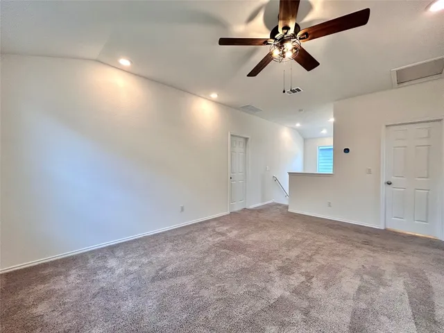 an empty room with fan