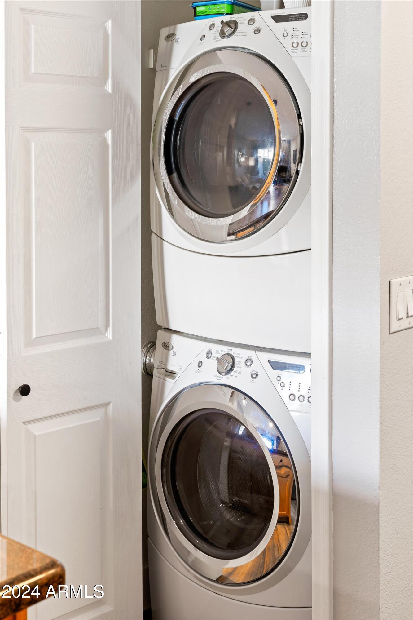 533 West Guadalupe Road, Unit 1063 Mesa, AZ 85210 - Photo 48 of 57 a utility room with dryer and washer