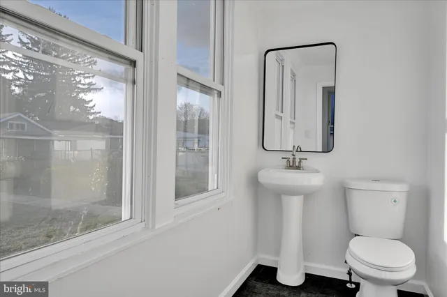 a view of a room that has a window