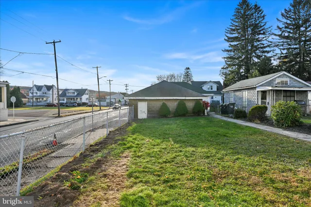 a front view of a house with a outdoor space
