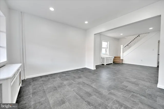 an empty room with window