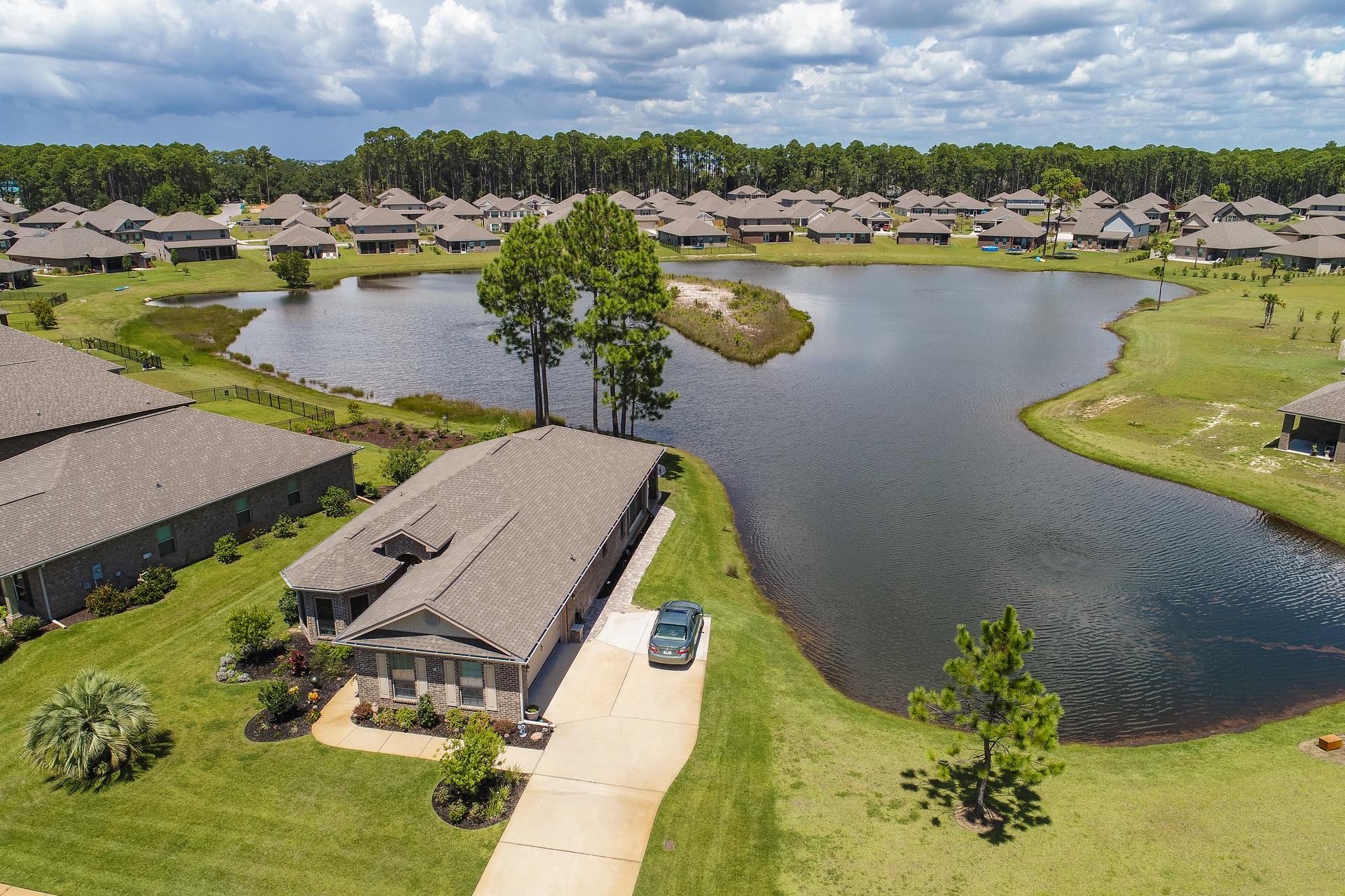 465 Pin Oak Loop Santa Rosa Beach, FL 32459 - Photo 25 of 38 an aerial view of a residential houses with outdoor space lake view and mountain view