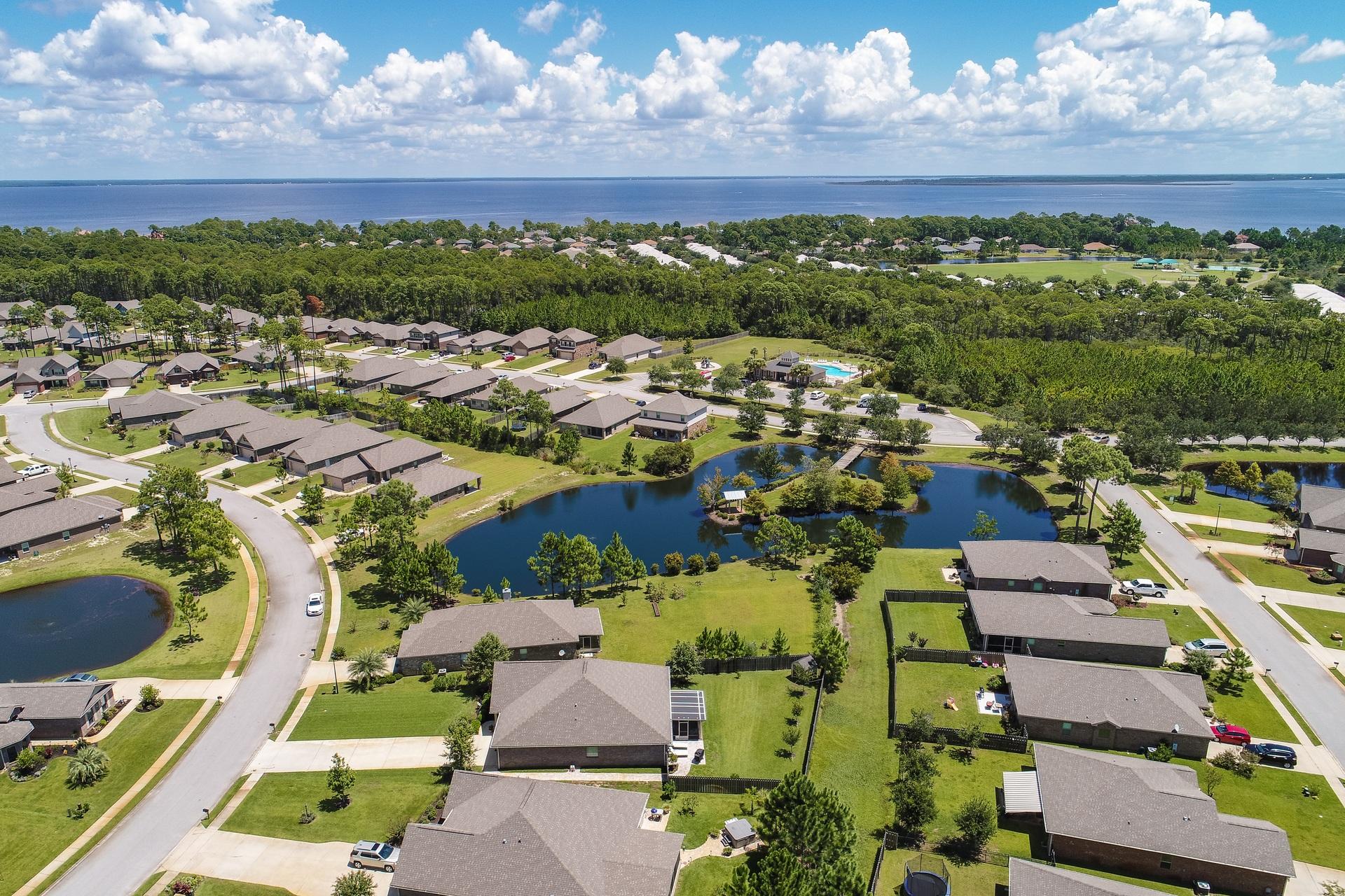 465 Pin Oak Loop Santa Rosa Beach, FL 32459 - Photo 28 of 38 an aerial view of residential houses with outdoor space
