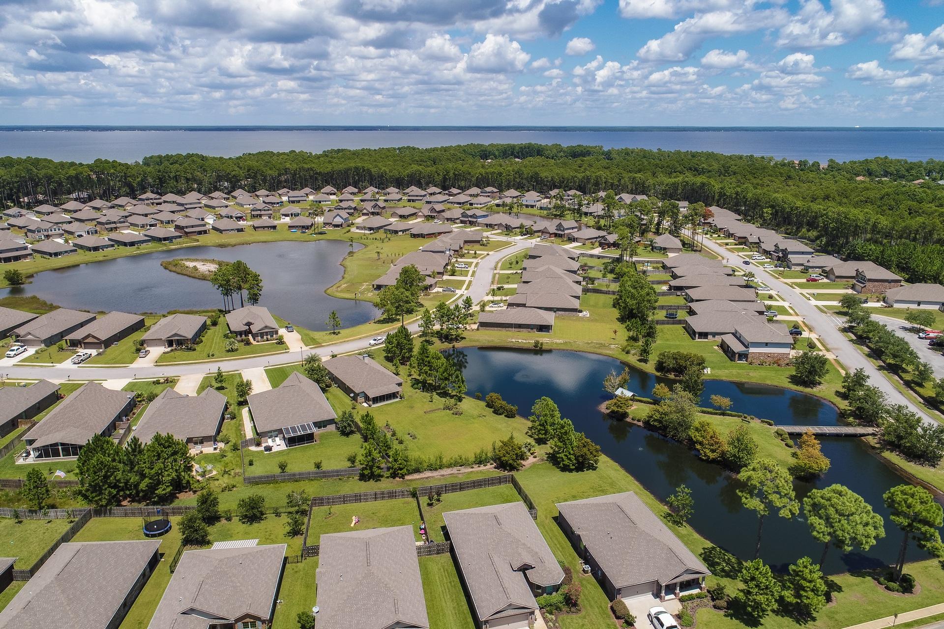 465 Pin Oak Loop Santa Rosa Beach, FL 32459 - Photo 29 of 38 an aerial view of residential houses with outdoor space