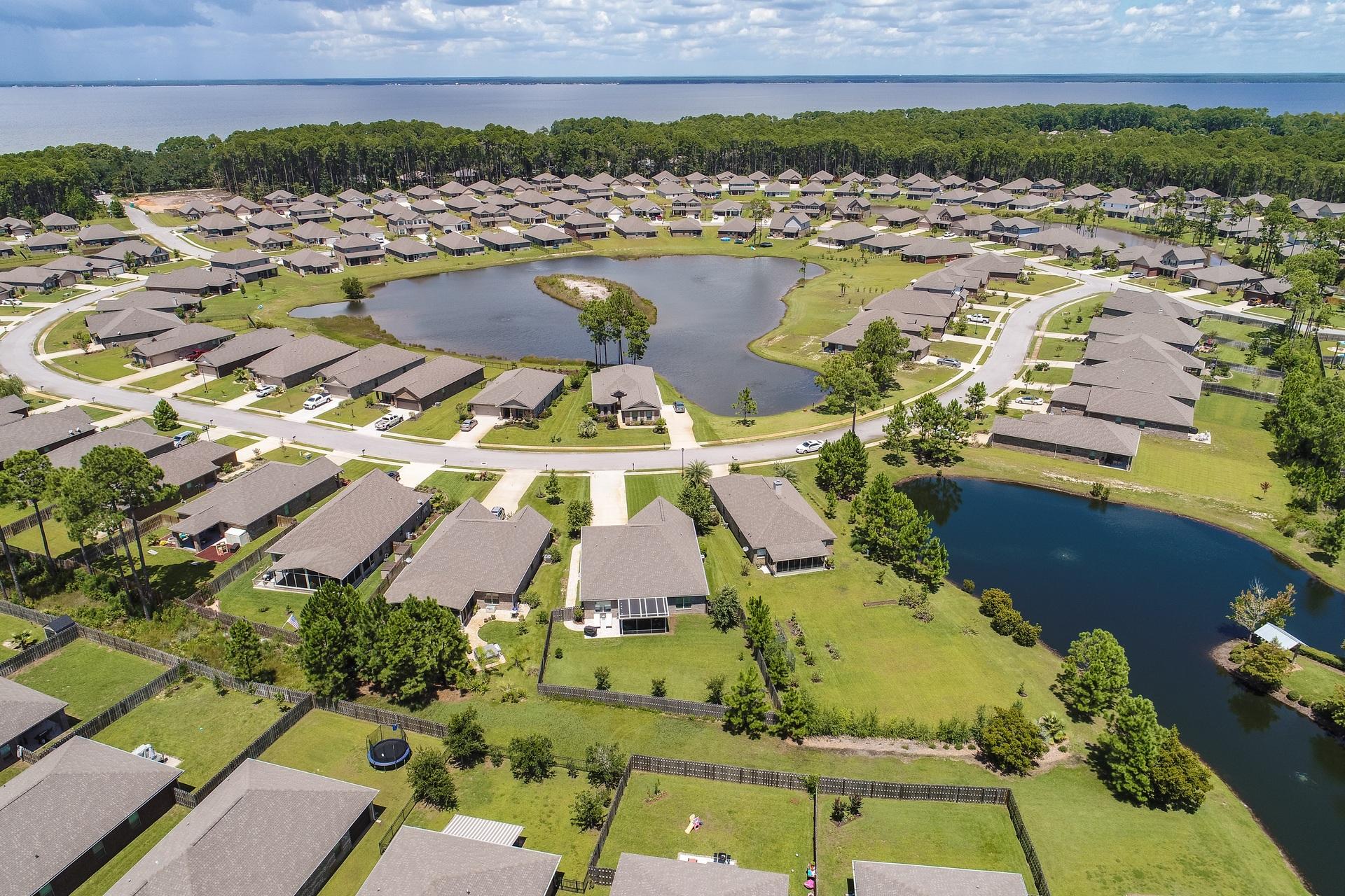 465 Pin Oak Loop Santa Rosa Beach, FL 32459 - Photo 30 of 38 an aerial view of residential houses with outdoor space