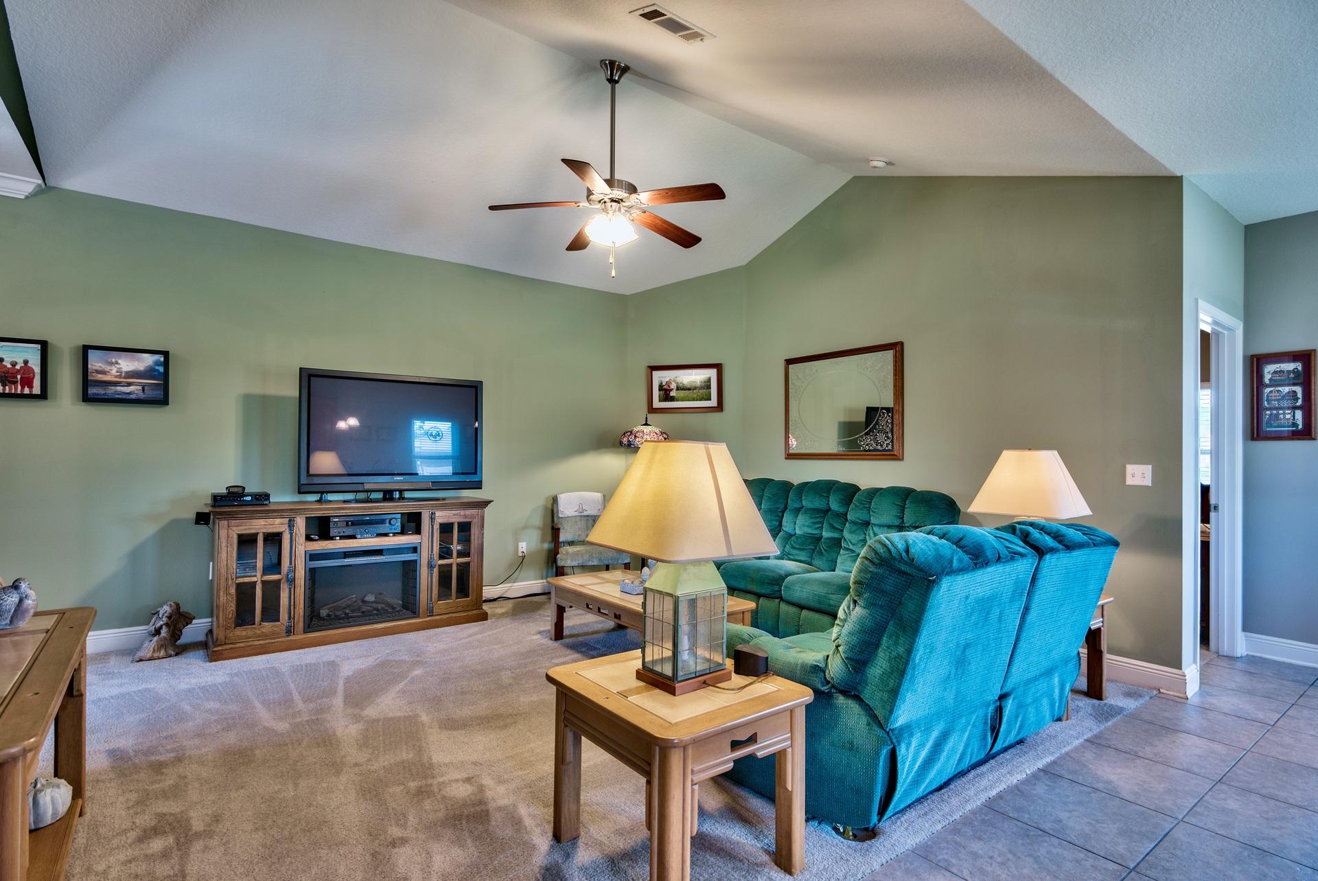 465 Pin Oak Loop Santa Rosa Beach, FL 32459 - Photo 5 of 38 a living room with furniture and a flat screen tv