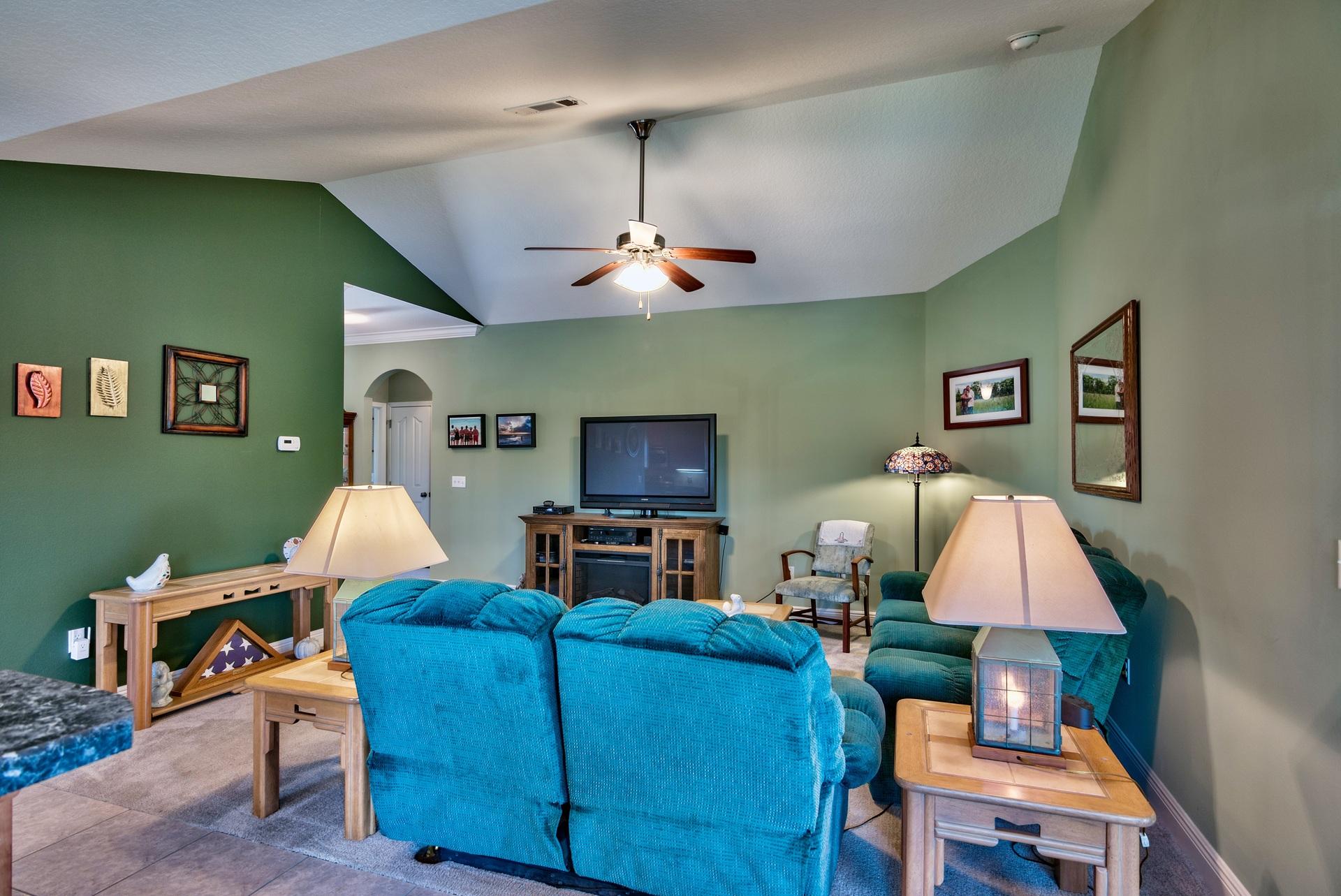 465 Pin Oak Loop Santa Rosa Beach, FL 32459 - Photo 6 of 38 a living room with furniture and a flat screen tv