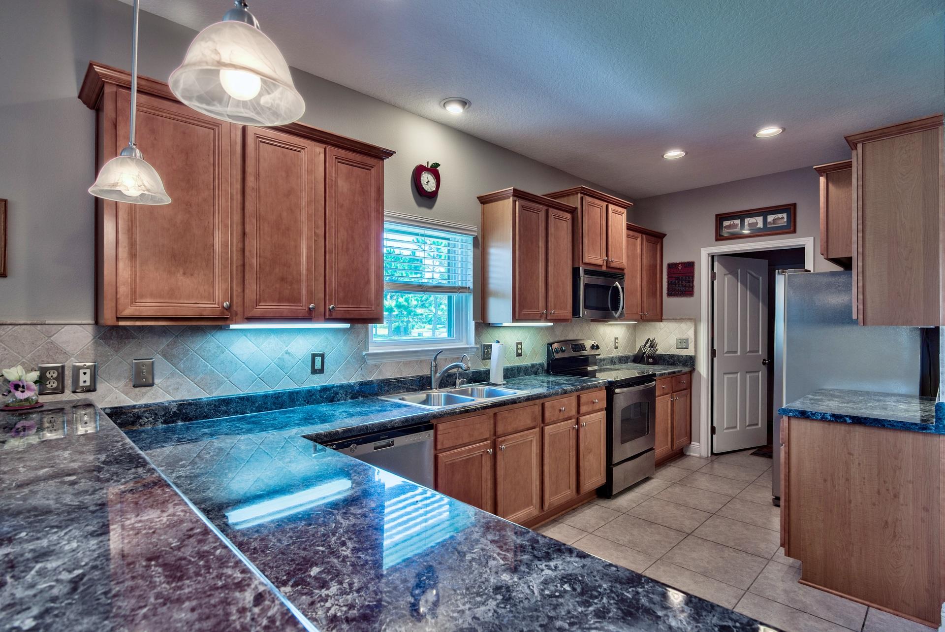 465 Pin Oak Loop Santa Rosa Beach, FL 32459 - Photo 8 of 38 a kitchen with stainless steel appliances granite countertop a sink refrigerator and cabinets