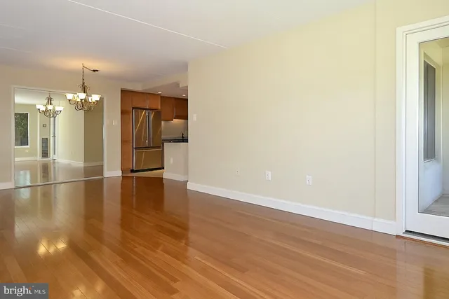 a view of a livingroom with wooden floor
