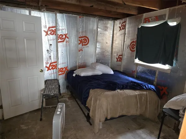 a view of a yard with a tree