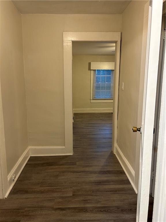 180 Harlan Road Southwest Atlanta, GA 30311 - Photo 15 of 20 a view of hallway with wooden floor
