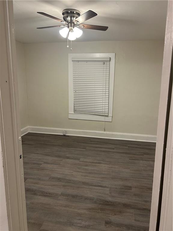 180 Harlan Road Southwest Atlanta, GA 30311 - Photo 17 of 20 a view of an empty room with a window