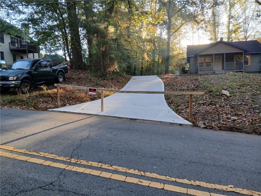180 Harlan Road Southwest Atlanta, GA 30311 - Photo 2 of 20 a backyard of a house with lots of green space