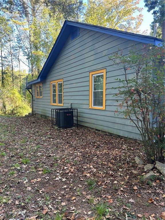 180 Harlan Road Southwest Atlanta, GA 30311 - Photo 4 of 20 a view of a house with a yard