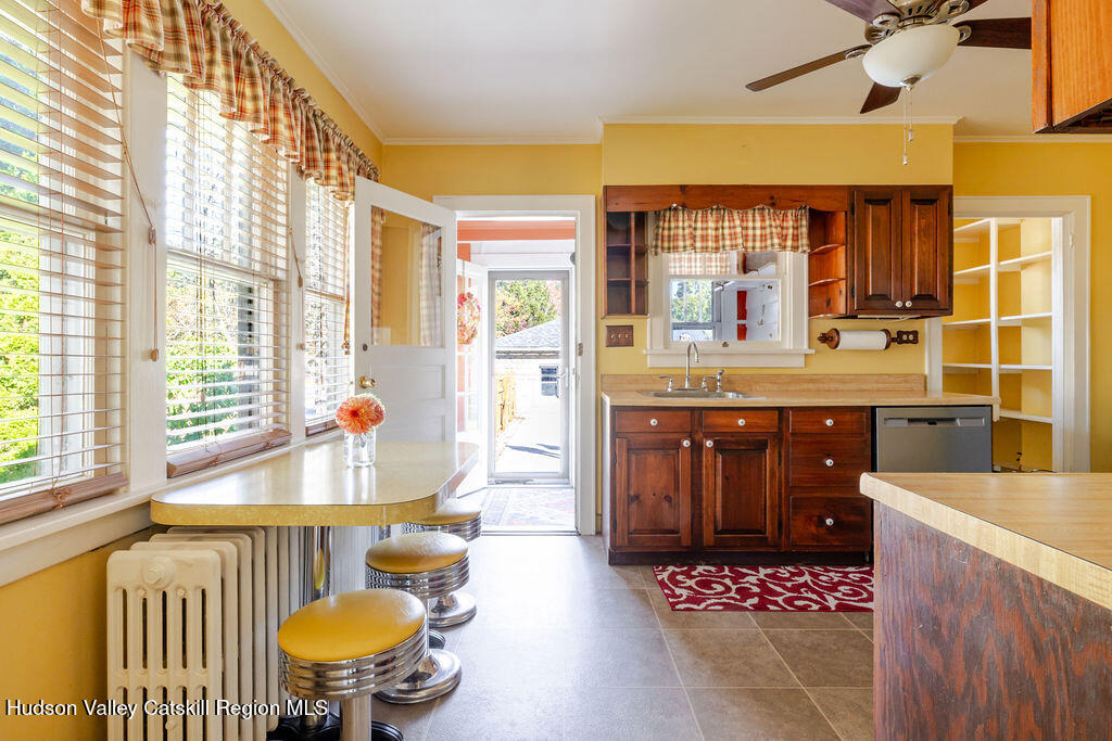 6 Hawley Road Niverville, NY 12130 - Photo 16 of 36 a living room with furniture and a large window