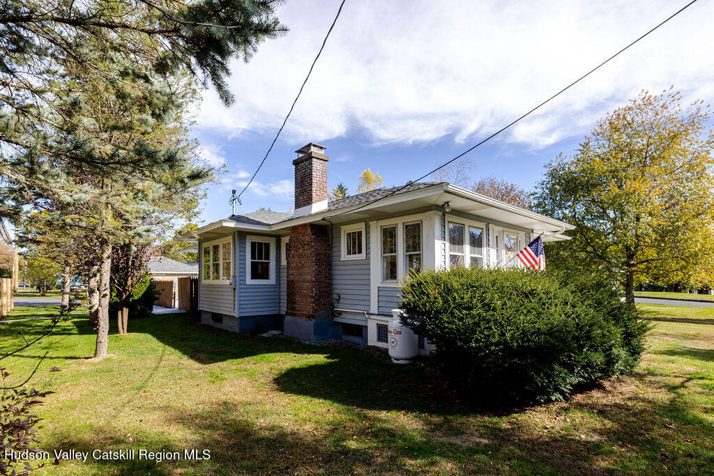 6 Hawley Road Niverville, NY 12130 - Photo 2 of 36 a front view of a house with a yard