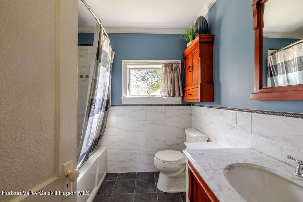 6 Hawley Road Niverville, NY 12130 - Photo 28 of 36 a bathroom with a sink toilet and shower