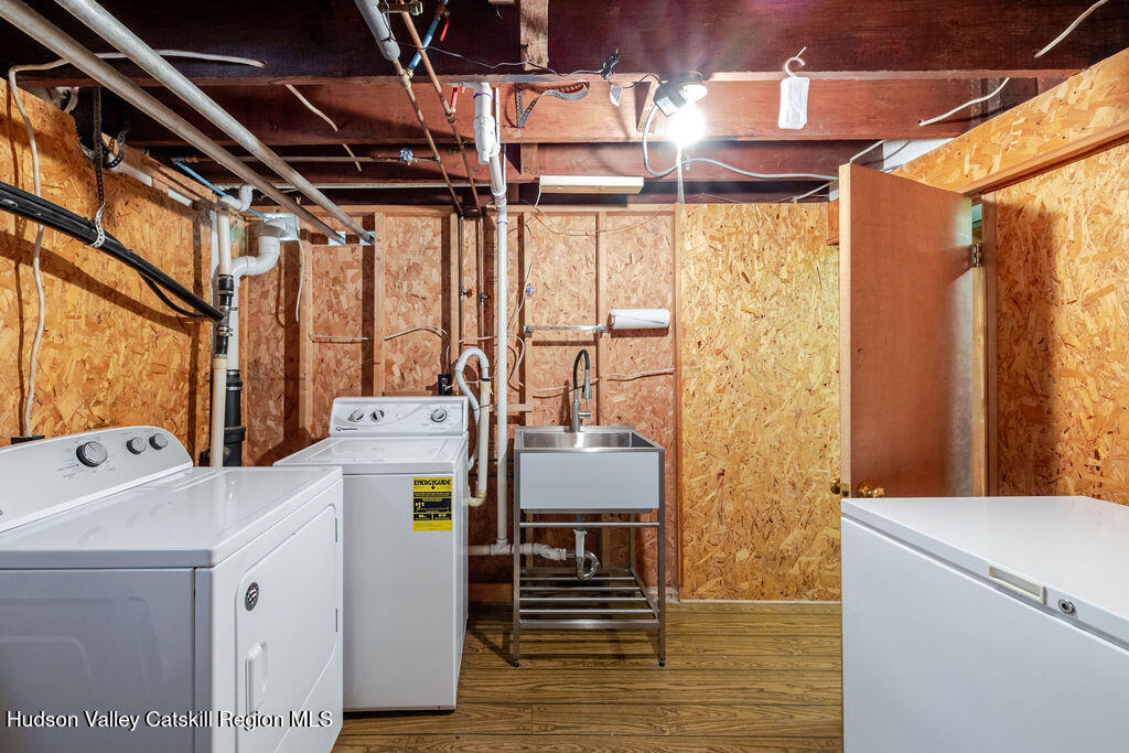 6 Hawley Road Niverville, NY 12130 - Photo 33 of 36 a utility room with dryer and washer