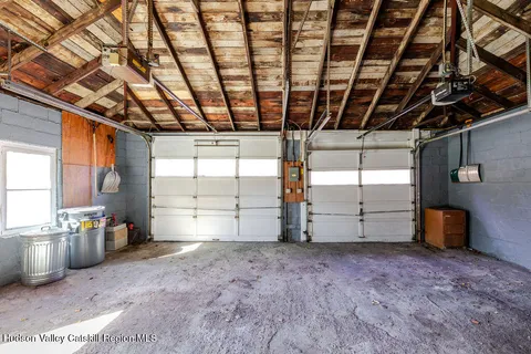 a view of a room with wooden walls