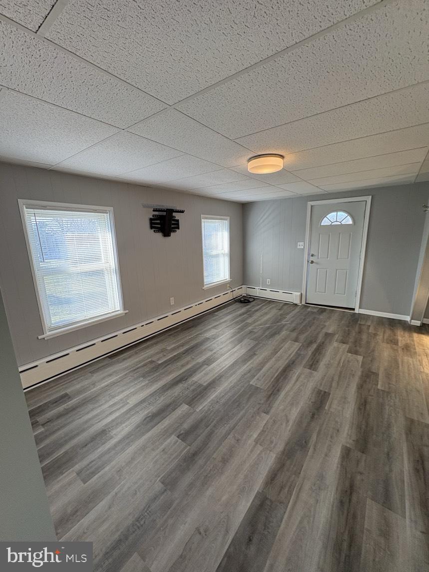613 Laudermilch Road, Unit 2 Hummelstown, PA 17036 - Photo 11 of 16 a view of empty room with wooden floor