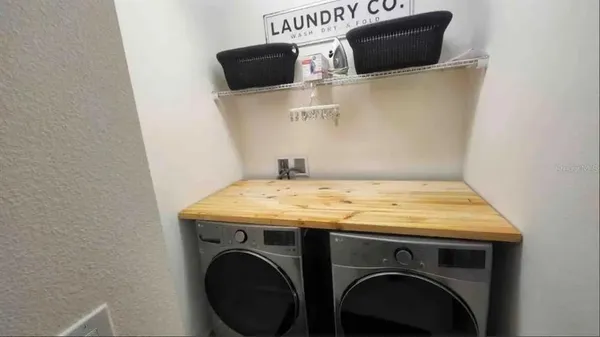 a room with furniture and screen