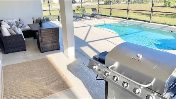 an aerial view of residential houses and outdoor space