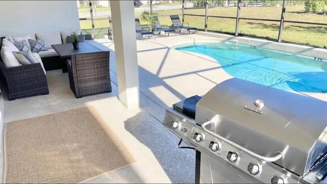 an aerial view of residential houses and outdoor space