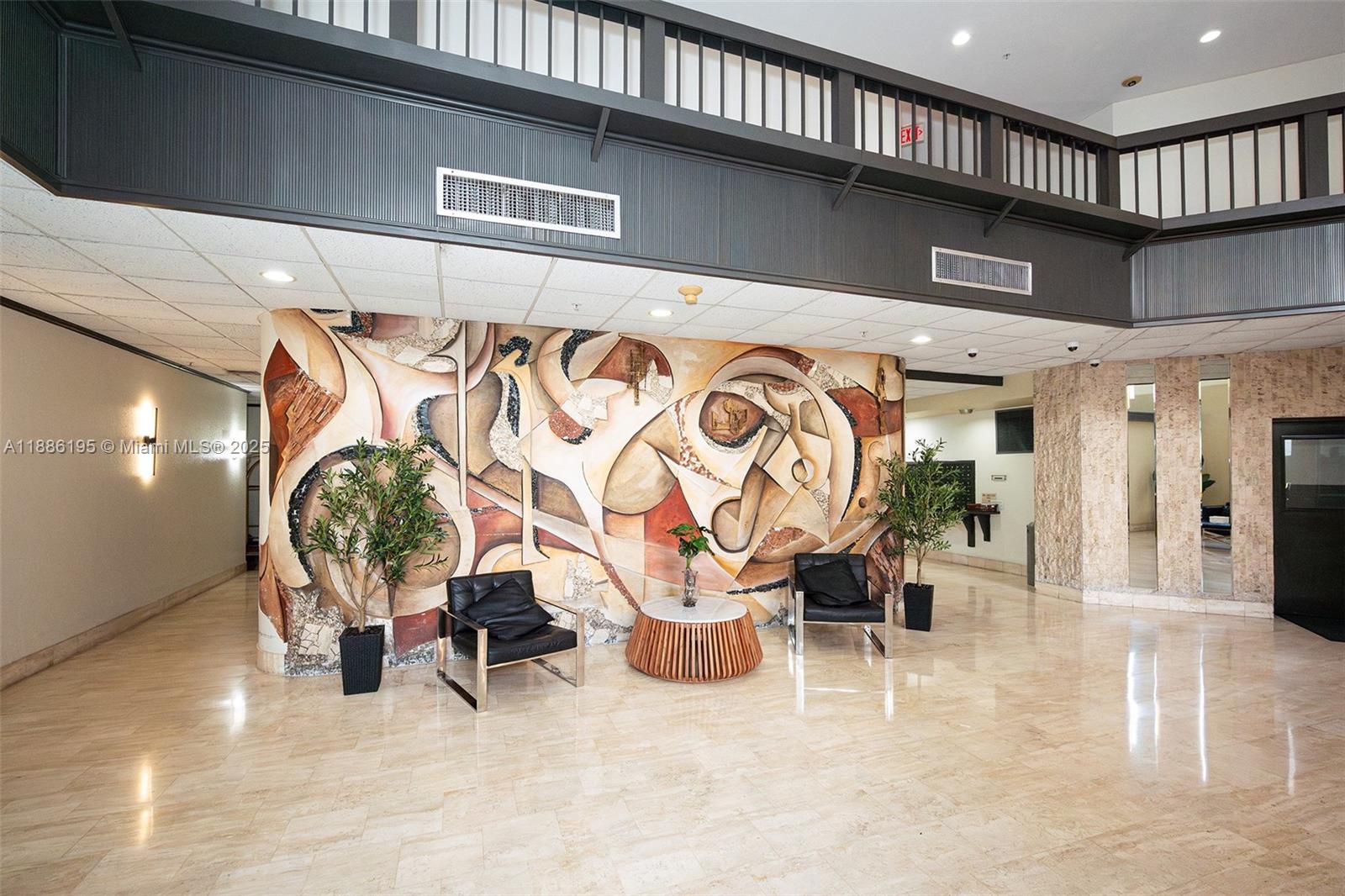2750 Northeast 183rd Street, Unit 2204 Aventura, FL 33160 - Photo 23 of 31 a view of a room with furniture and a chandelier