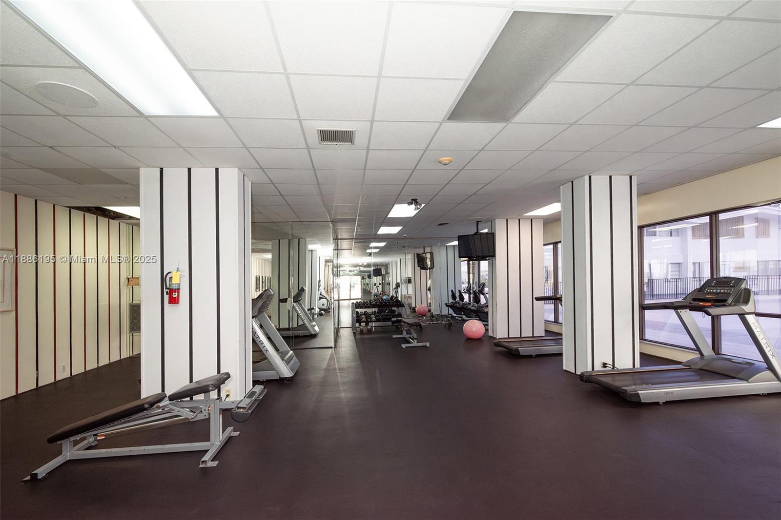 2750 Northeast 183rd Street, Unit 2204 Aventura, FL 33160 - Photo 28 of 31 a view of a room with gym equipment