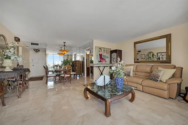 a living room with furniture and a table