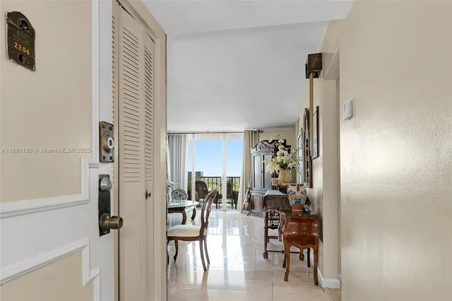 a view of a livingroom with furniture and a window