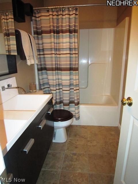 4380 Sexton Road Cleveland, OH 44105 - Photo 8 of 17 The full bath features ceramic tile floors, custom fixtures and amazing sink cabinetry!