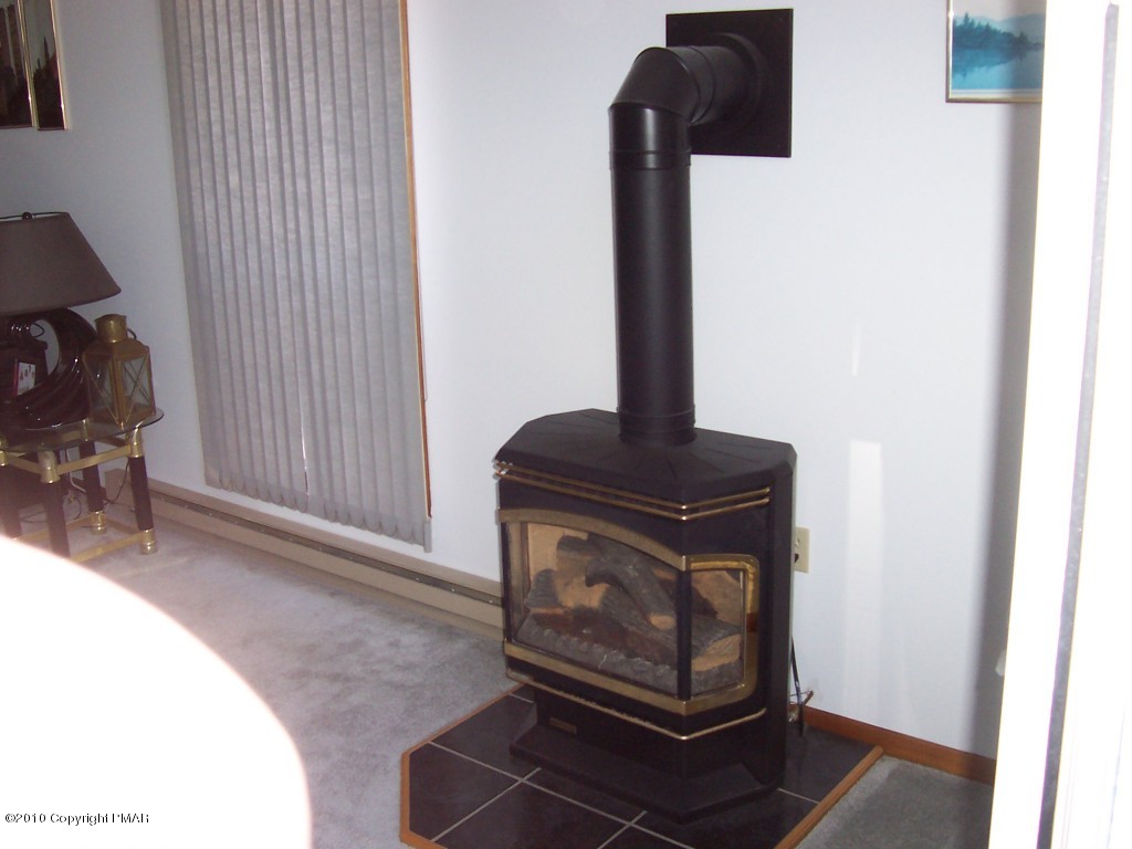 53 Crestview Road Blakeslee, PA 18610 - Photo 3 of 10 a stove top oven sitting inside of a kitchen