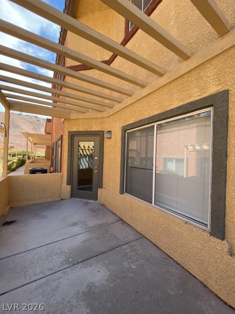 4915 East Russell Road, Unit 147 Las Vegas, NV 89120 - Photo 2 of 14 View of patio with a mountain view