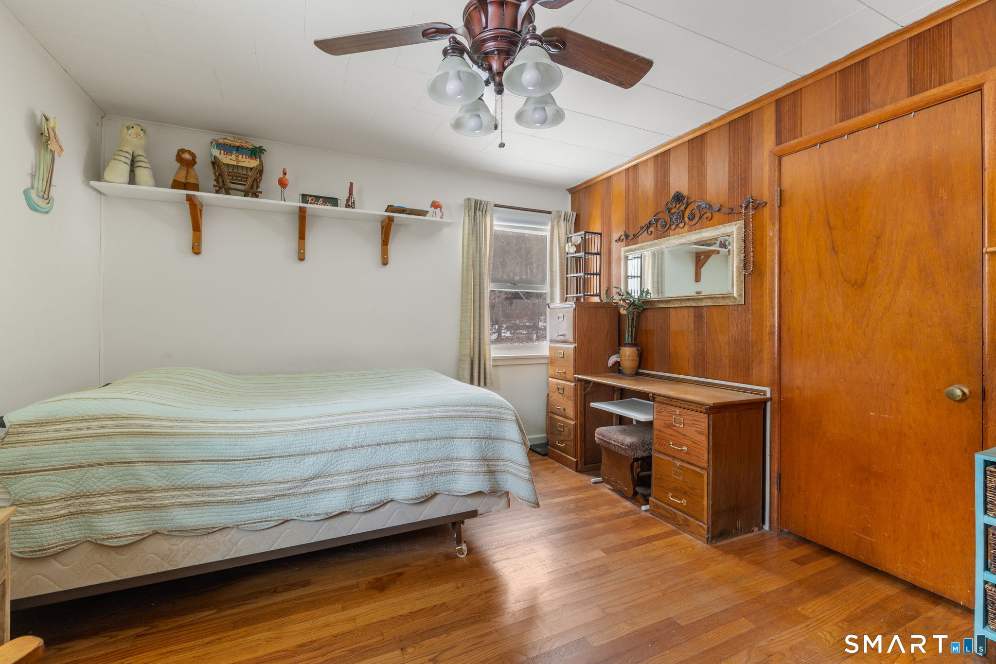 52 North Glenwoods Road Ledyard, CT 06335 - Photo 15 of 27 a bedroom with a bed and cabinets