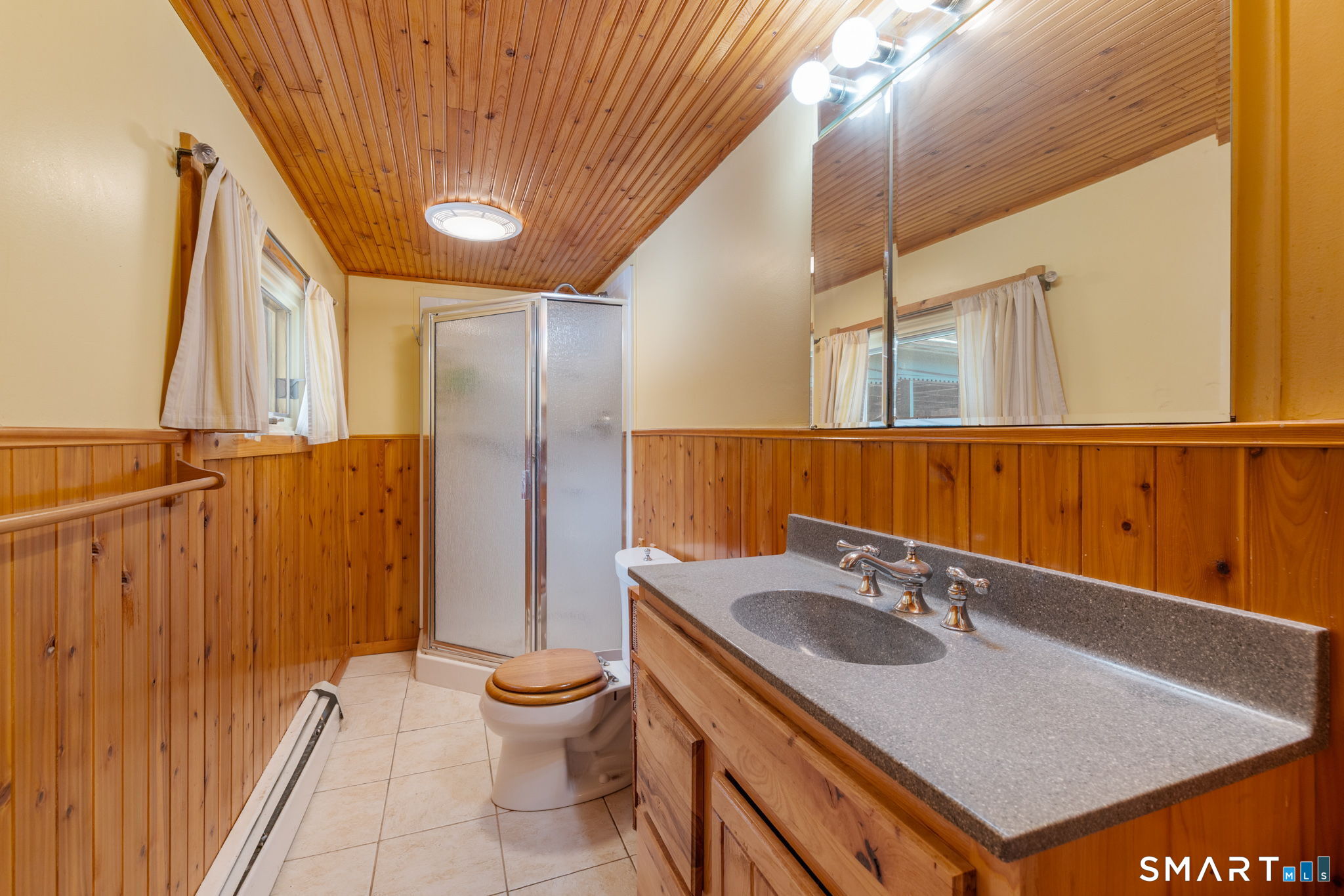 52 North Glenwoods Road Ledyard, CT 06335 - Photo 20 of 27 a bathroom with a sink a toilet and shower