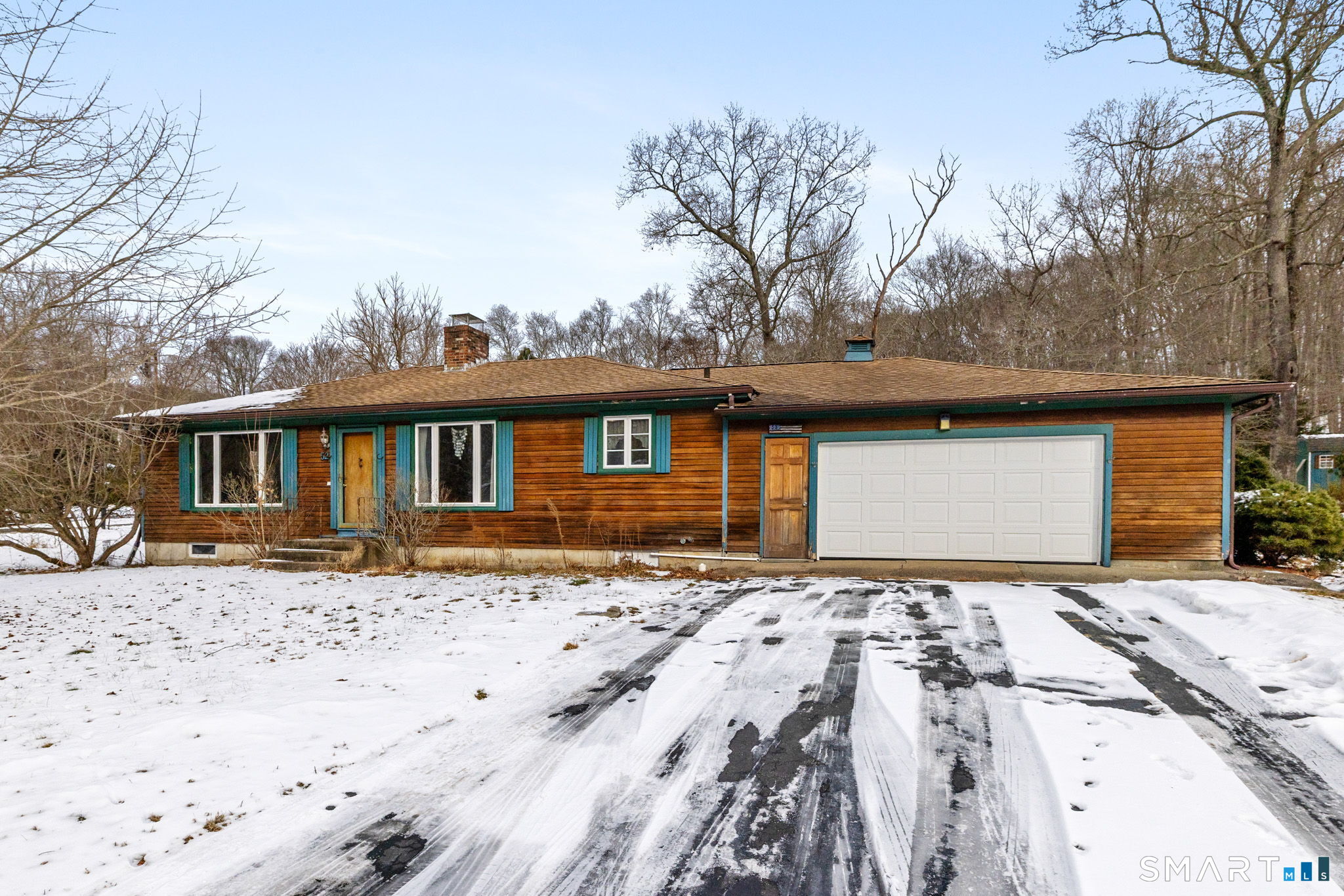 52 North Glenwoods Road Ledyard, CT 06335 - Photo 2 of 27 a front view of a house with a yard