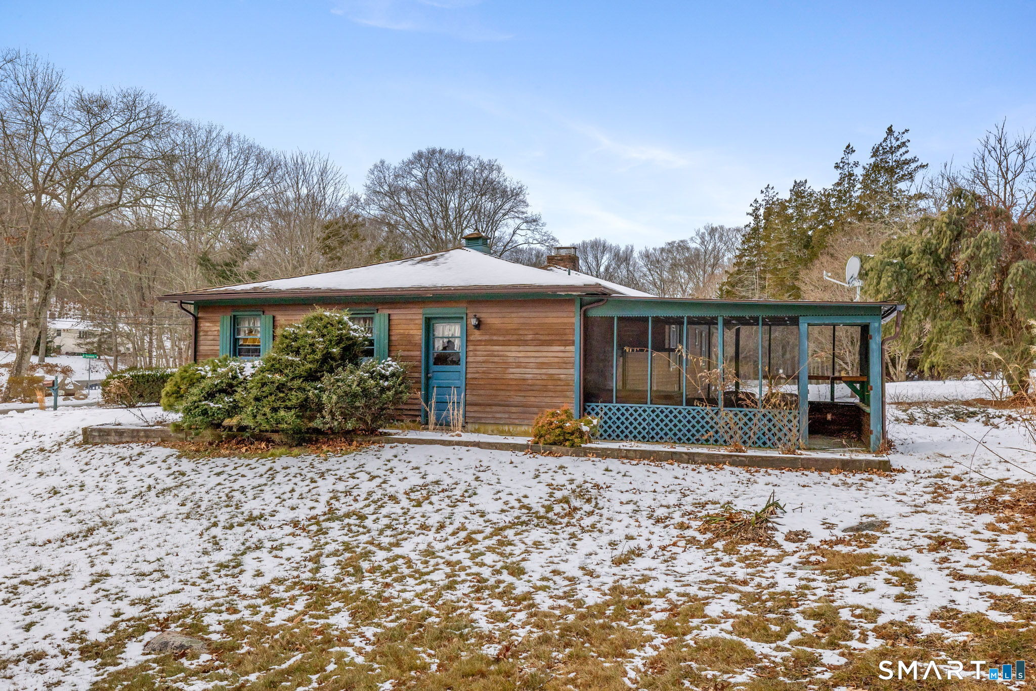 52 North Glenwoods Road Ledyard, CT 06335 - Photo 25 of 27 a front view of a house with garden