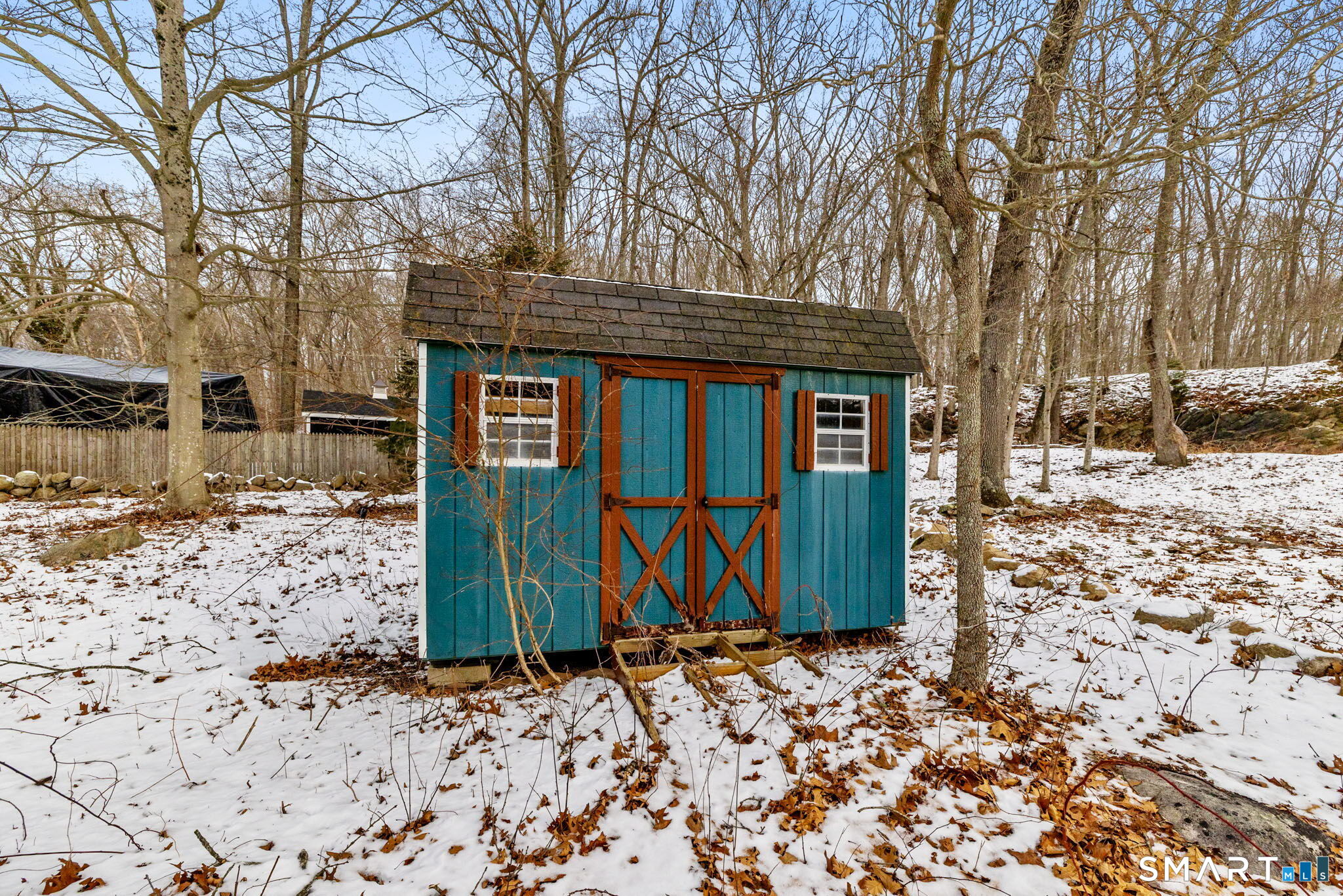 52 North Glenwoods Road Ledyard, CT 06335 - Photo 26 of 27 a view of a brick house with large outdoor space