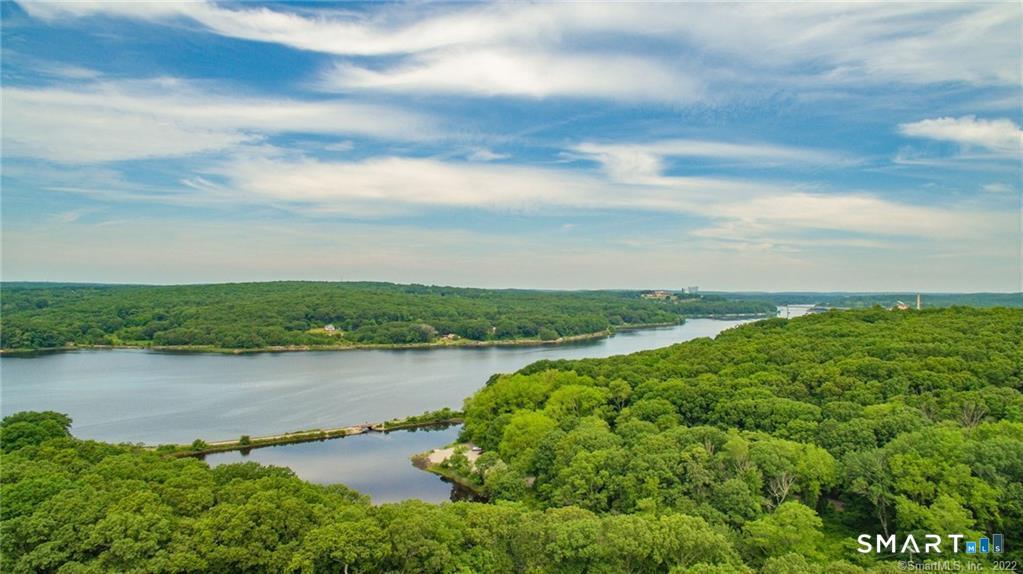 52 North Glenwoods Road Ledyard, CT 06335 - Photo 27 of 27 a view of a lake with houses in the back